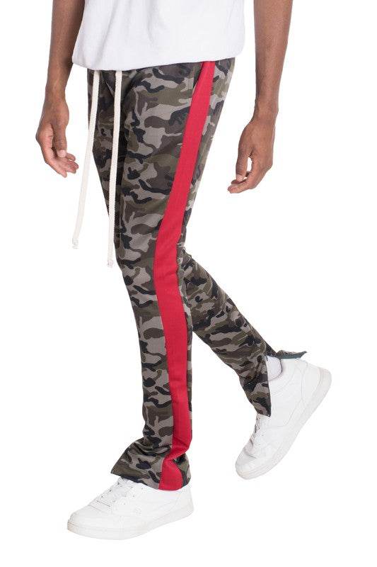 NEUTRAL BLACK CAMO TRACK PANTS RED